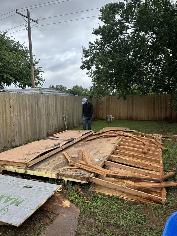 Shed demo — torn structure down, backyard before cleanup
