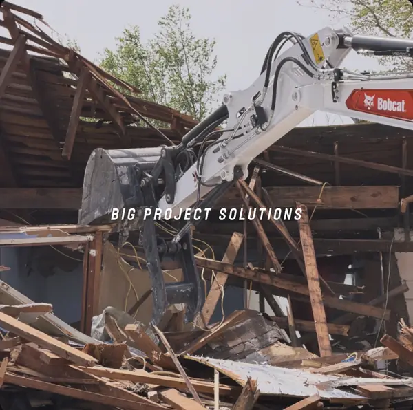 Residential house demolition with a Bobcat E60 at work