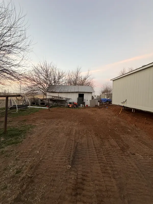 Dusk view — land cleared for mobile home set