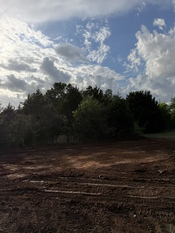 Site graded after clearing — land prep complete