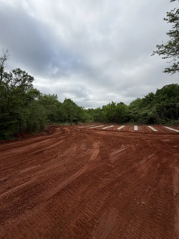 Grading around new construction — backyard leveled