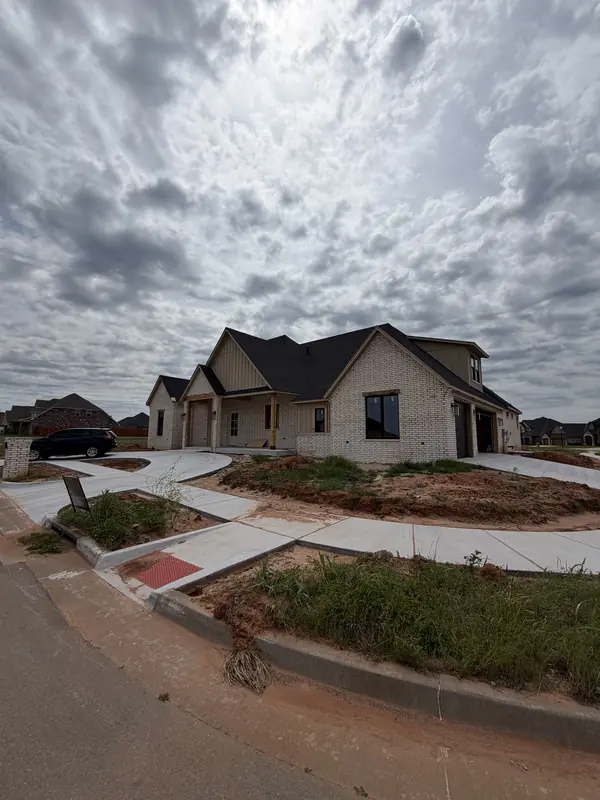 New home rear — yard graded and leveled for landscaping